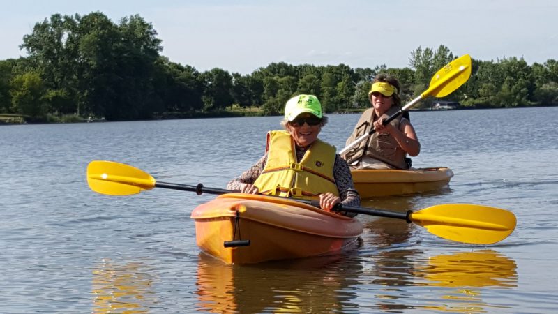 two seniors kayaking