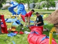 people building the playground equipment
